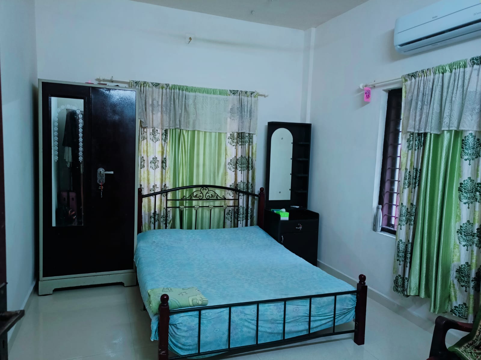Comfortable AC room at our family homestay in Alappuzha.