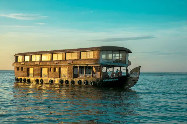 Luxury houseboat cruising Vembanad Lake near Alleppey